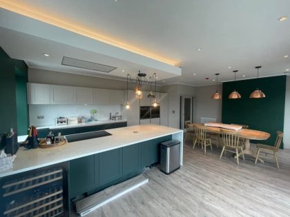 Vinyl flooring in a green kitchen