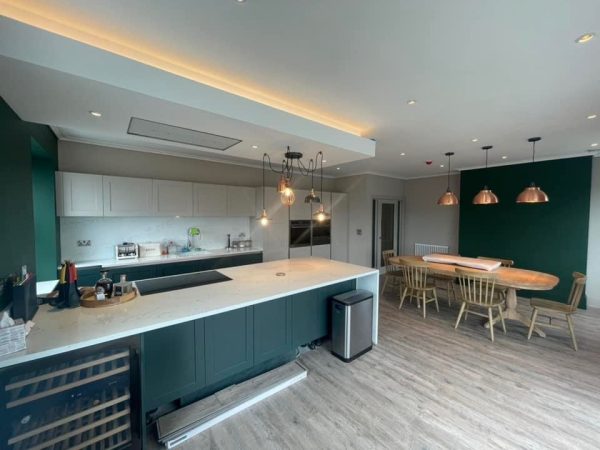 Vinyl flooring in a green kitchen