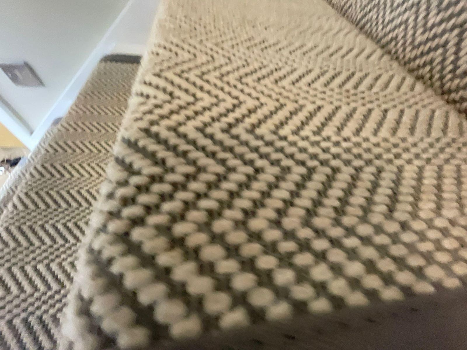 Close up of hatched carpet pattern from crown carpets