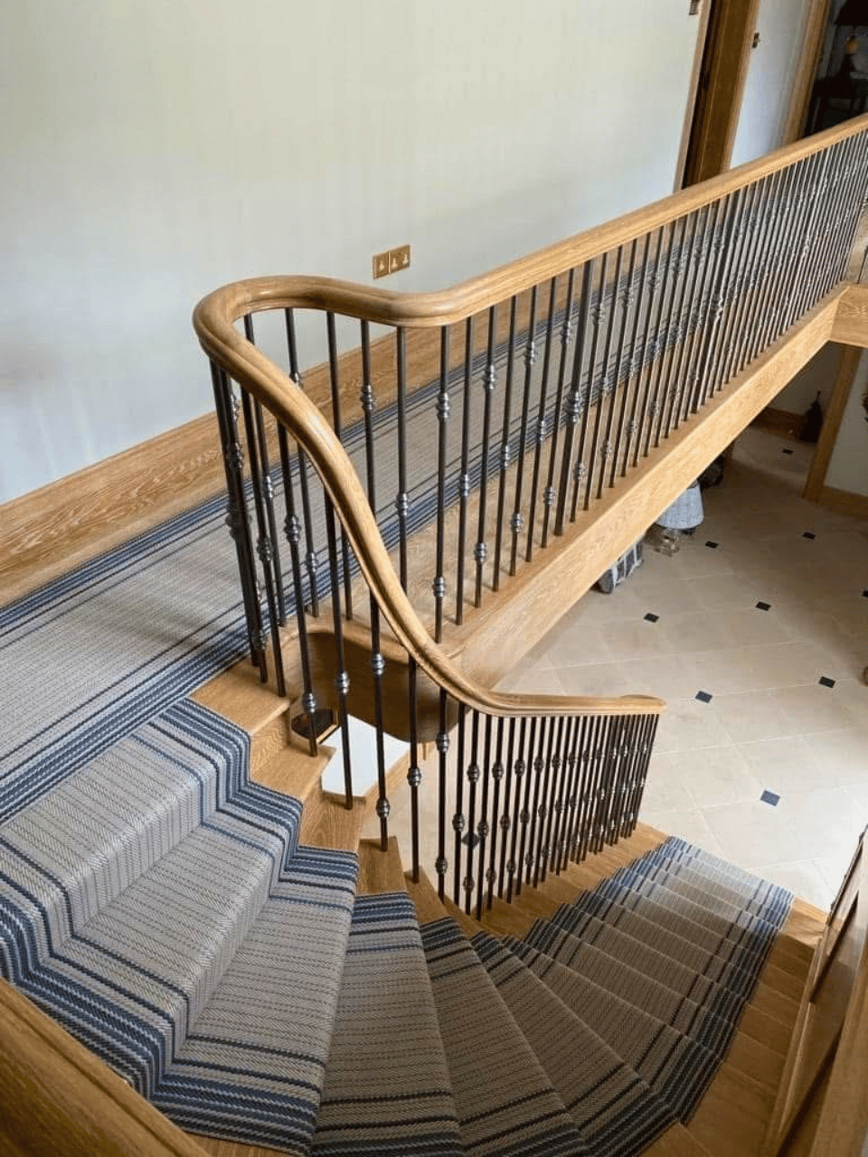 Roger Oats Stairs Carpet - grey stair carpet on landing and stairs in stately home.